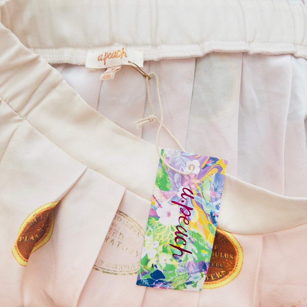 A PEACH ~ Light Pink Floral Pleated Skirt Side Zipper and Elastic Waistband Back - Picture 3 of 11